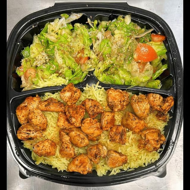 Garlic & Lemon Chicken on Rice & Salad+Soda.