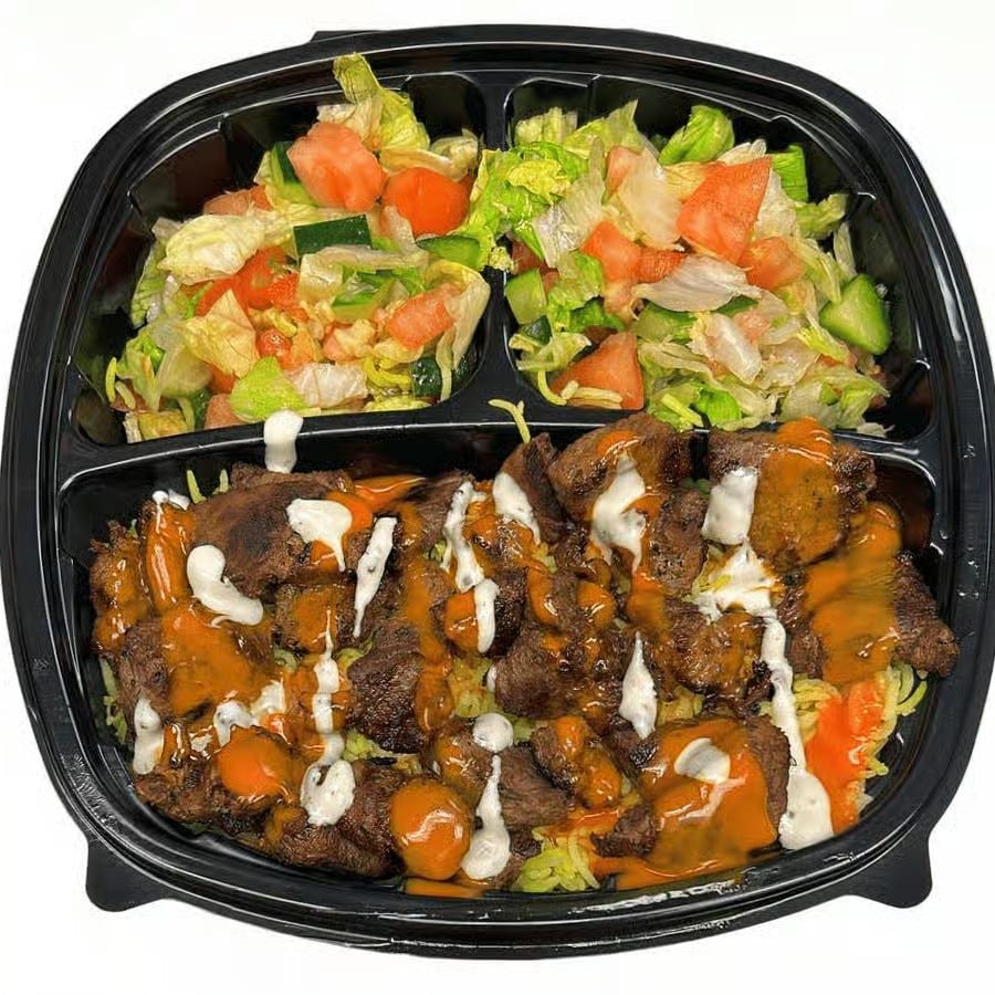 Grilled Lamb on Rice with Salad & Buffalo + Ranch Sauce on the top.